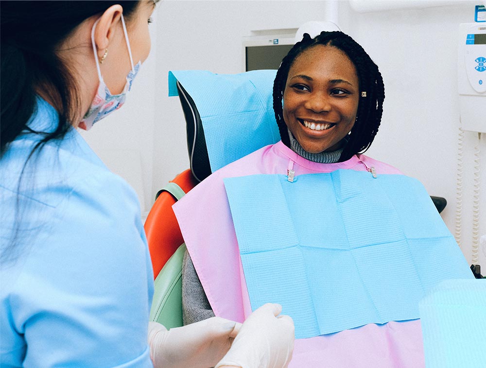 dental professional talking to patient